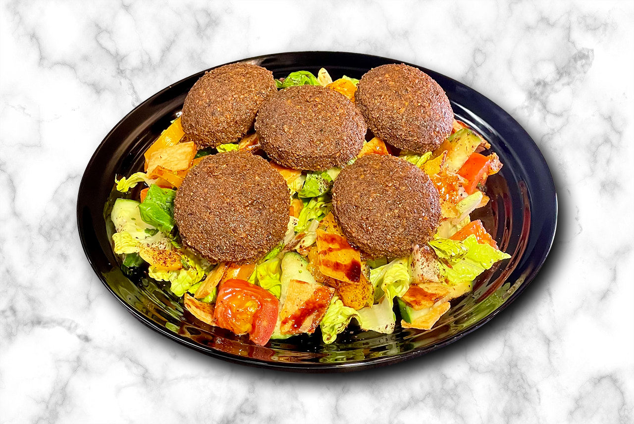 Falafel Salad - green salad topped with crispy chickpea patties - vegetarian protein-packed meal Calgary