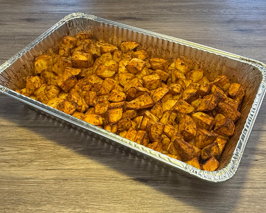 Roasted garlic potatoes catering tray Calgary Middle Eastern buffets