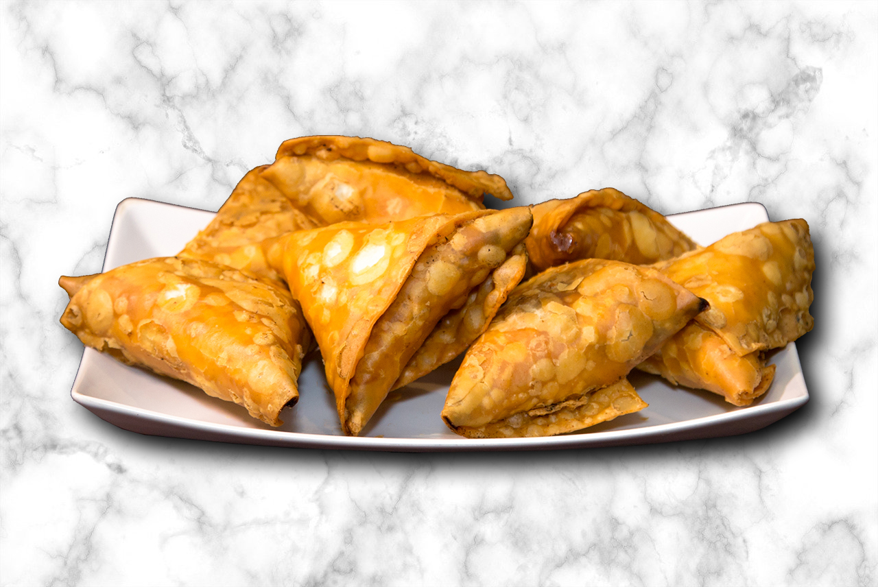 Beef Chicken Veggie Samosa - crispy pastry filled with spiced meat or vegetables - Middle Eastern appetizer