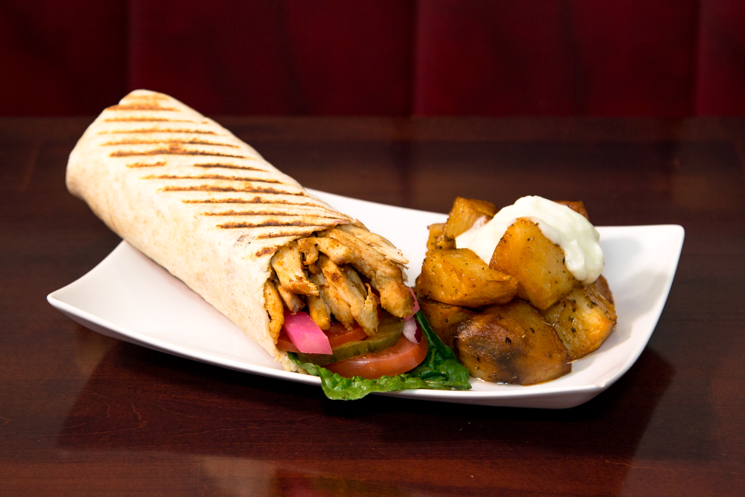 Chicken shawarma wrap and garlic potatoes